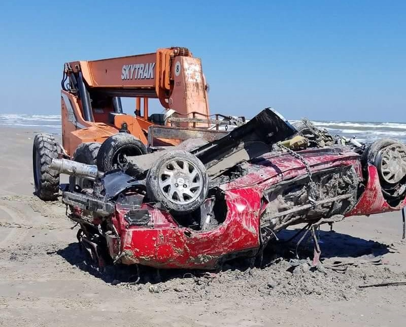 Illustration for article titled Assholes Brag About Crushing A Honda Prelude Buried On A Beach By Hurricane Harvey (Update)
